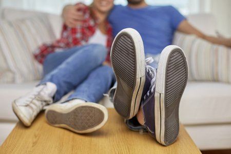 people sitting on a couch 