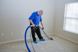 man cleaning floor